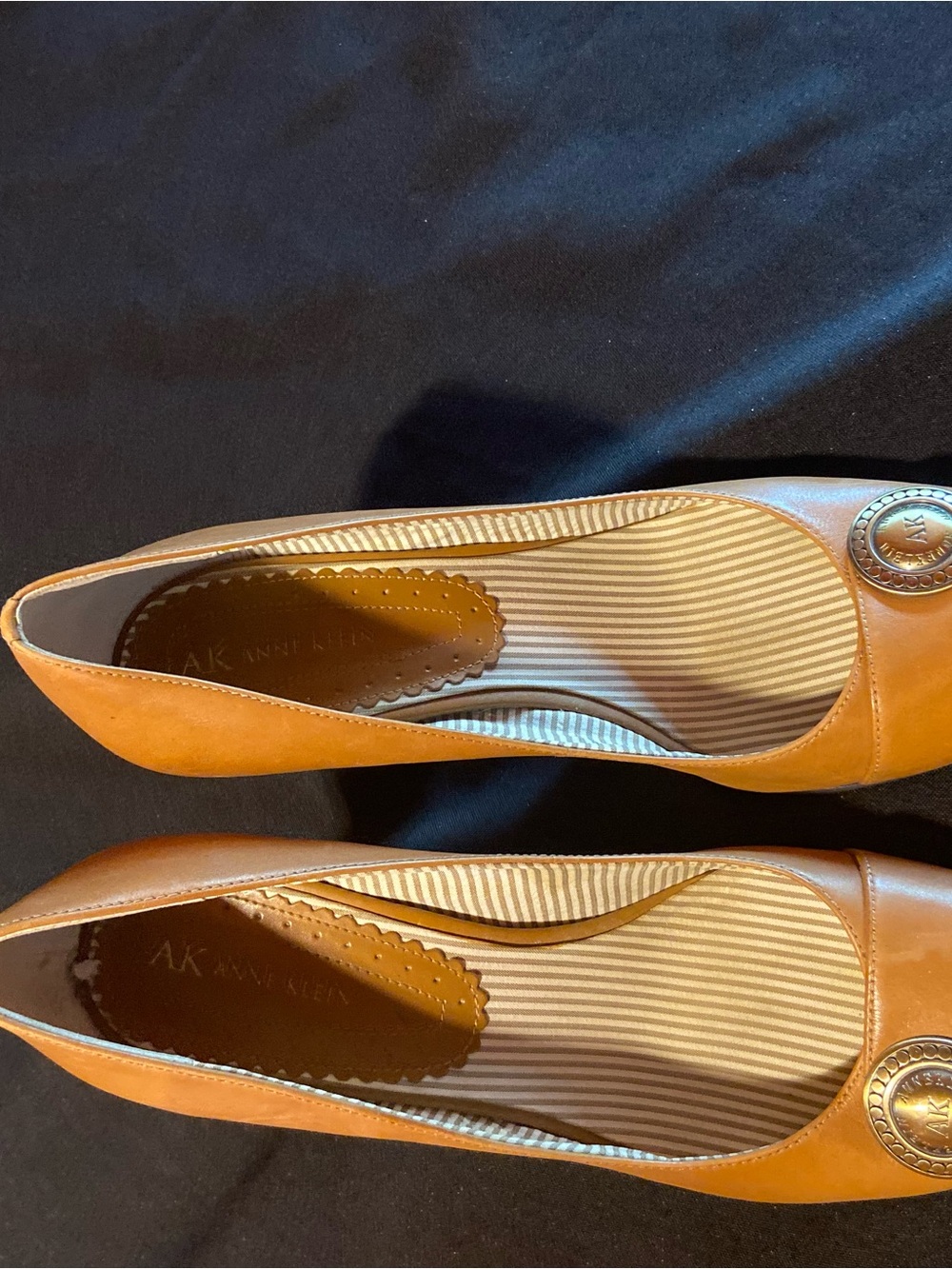 Anne Klein Cognac Leather Ballet Flats with Gold Medallion